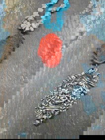 Turquoise and Red Stone Necklace With Metal Chief Pendant