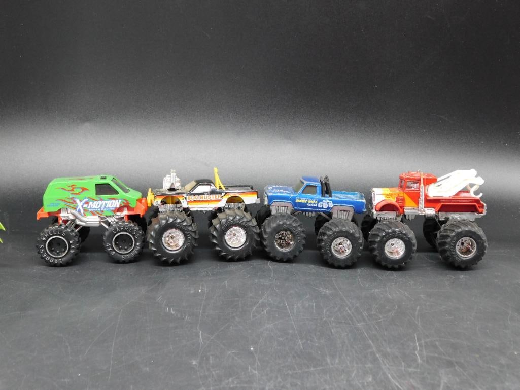 Four Die-Cast Monster Truck Toys with Oversized Tires (1 of 8)