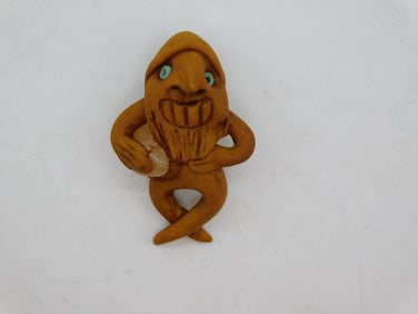 CLAY MAN WITH STONE