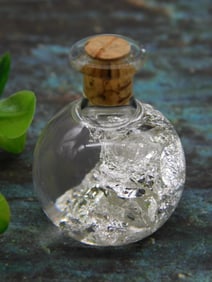 Glass Vial With Cork and Crystalline Contents