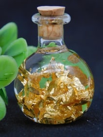 REAL 22 K GOLD FLAKES IN BOTTLE ROCK STONE LAPIDARY SPECIMEN