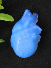 Carved Blue Heart Figurine in Anthropomorphic Design