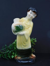 Vintage Ceramic Figurine of Person Holding Jug
