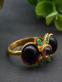 Gold-Tone Ring with Purple and Green Stone Accents