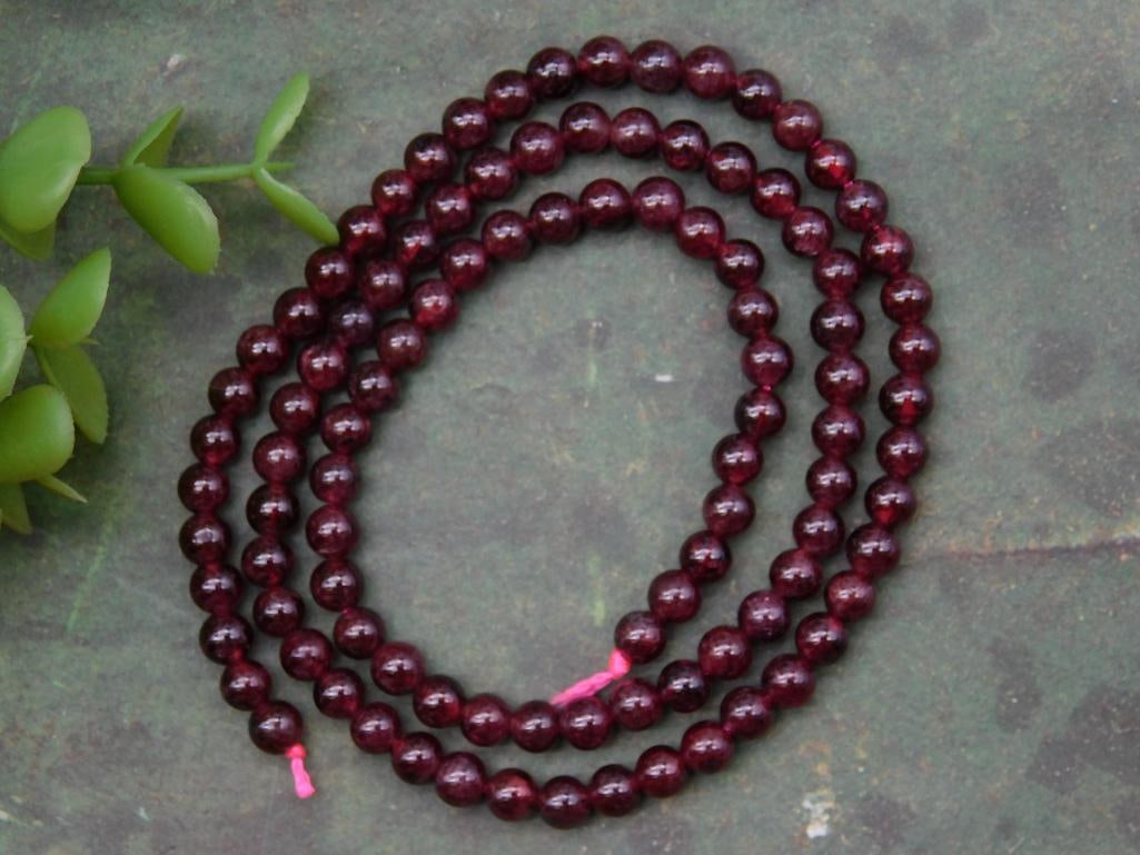 Garnet Bead Strand With Pink String ROCK STONE LAPIDARY SPECIMEN: Garnet Bead Strand With Pink String ROCK STONE LAPIDARY SPECIMEN