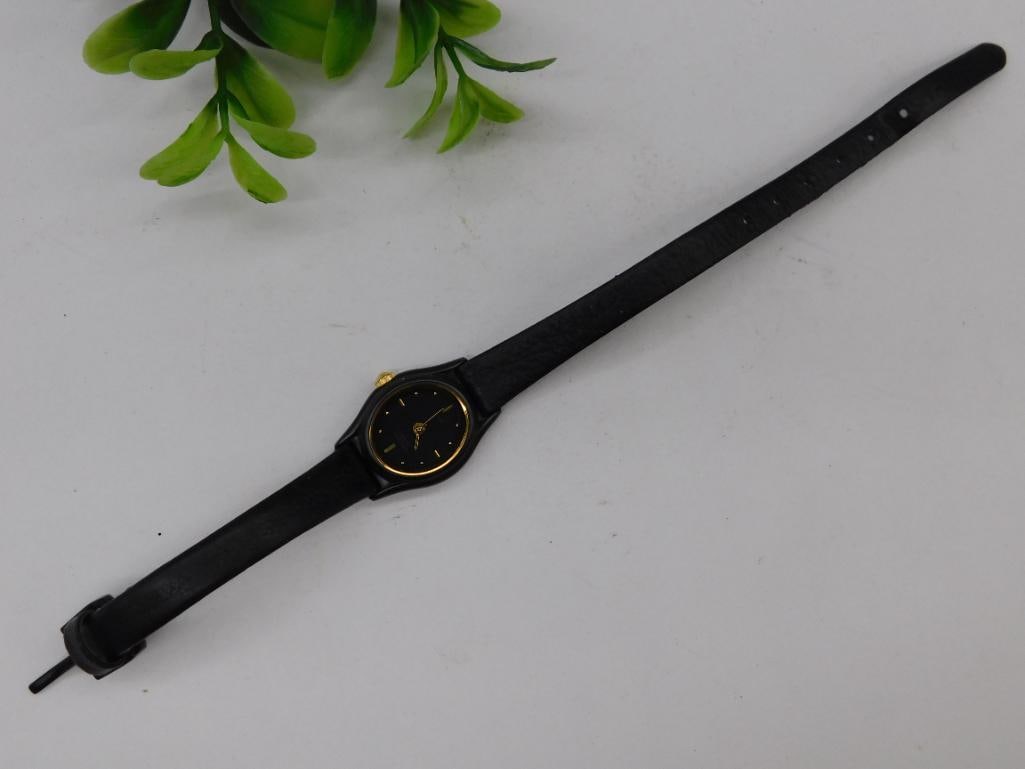 Black Leather-Band Wristwatch with Gold Accents WATCHMAKER WATCHMAKING TOOLS: Black Leather-Band Wristwatch with Gold Accents WATCHMAKER WATCHMAKING TOOLS