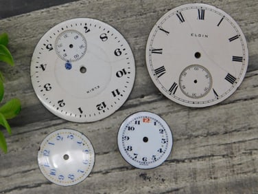Four Vintage Watch Faces in Various Styles