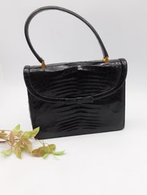 Black Embossed Leather Handbag with Bow Detail