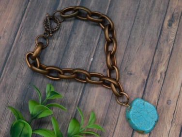 Bronze-Tone Chain Bracelet with Turquoise-Colored Stone Pendant
