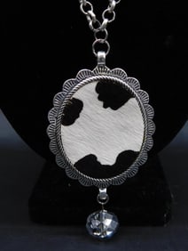 COW HIDE PENDANT ON CHAIN NECKLACE