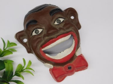 Vintage Cast Iron Americana Bottle Opener with Face Design