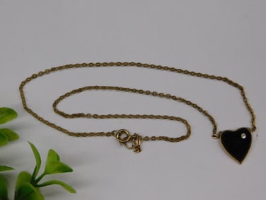 Gold-Tone Heart Pendant Necklace with Black Inlay and Stone