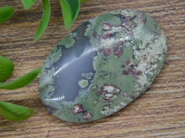 Oval-Shaped Moss Agate Cabochon