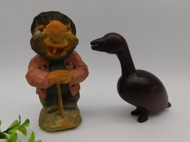 Hand-Carved Wooden Figures of Man and Animal