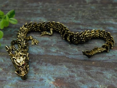 Gold-Tone Metal Dragon Figurine With Red Eyes