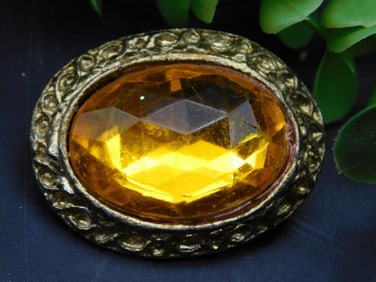 Vintage Amber-Colored Oval Brooch With Gold-Tone Design