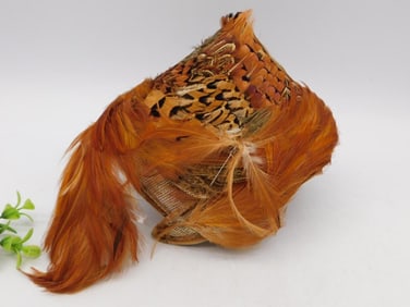 Vintage Feathered Hat with Orange and Brown Tones