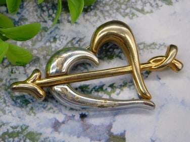 Gold and Silver-Tone Heart-Shaped Brooch with Arrow Motif