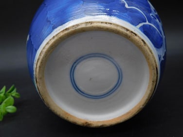 Blue and White Ceramic Jar with Floral Design