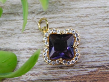 Gold Pendant With Purple Gemstone And Crystals
