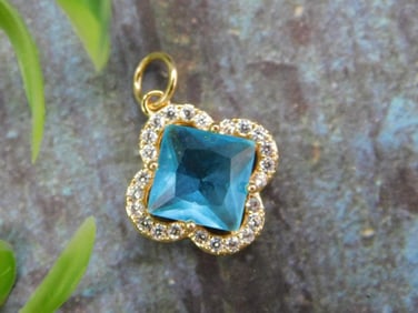 Gold-Tone Pendant With Blue Stone and Diamond-Like Accents