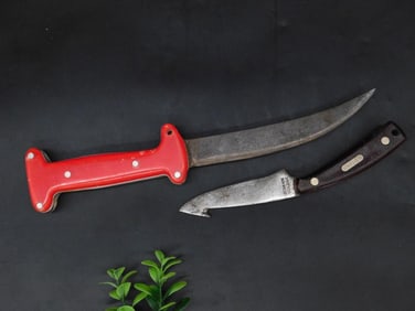 Two Fixed-Blade Knives with Red and Black Handles