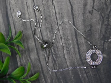 Silver-Tone Adjustable Bracelet with Circle Pendant