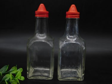 2 Vintage Gemco Bottles with Red Plastic Caps