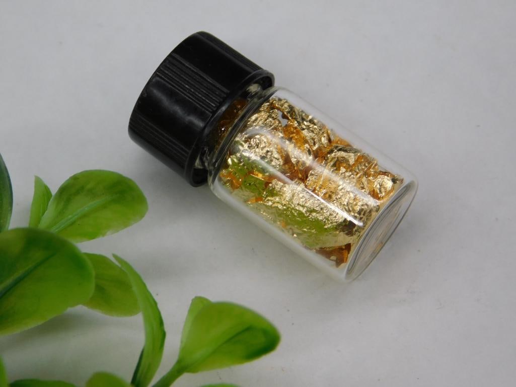 Small Glass Vial Containing Gold Flakes and Nuggets: Small Glass Vial Containing Gold Flakes and Nuggets