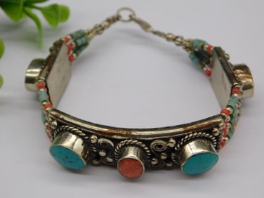 Handcrafted Bracelet with Turquoise and Coral Accents