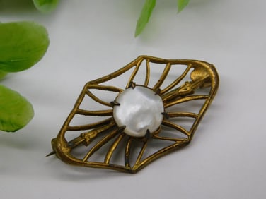 Vintage Gold-Tone Brooch with White Centerpiece