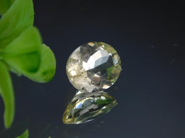 Oval-Cut Yellow Gemstone with Faceted Finish ROCK STONE LAPIDARY SPECIMEN