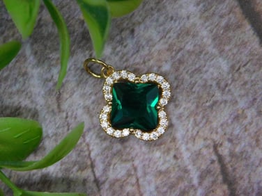 Gold-Tone Pendant with Green Gemstone and Clear Accents