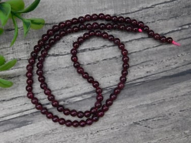 Deep Garnet Beaded Necklace with Round Stones