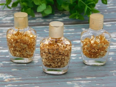 GOLD FLAKES IN BOTTLE ROCK STONE LAPIDARY SPECIMEN