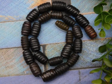 Strand of Dark Brown Barrel-Shaped Beads