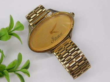 Gold-Tone Oval Wristwatch with Personalized Dial WATCHMAKING WATCHMAKER TOOLS