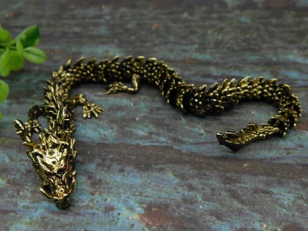 Gold-Tone Metal Dragon Figurine With Red Eyes: Gold-Tone Metal Dragon Figurine With Red Eyes