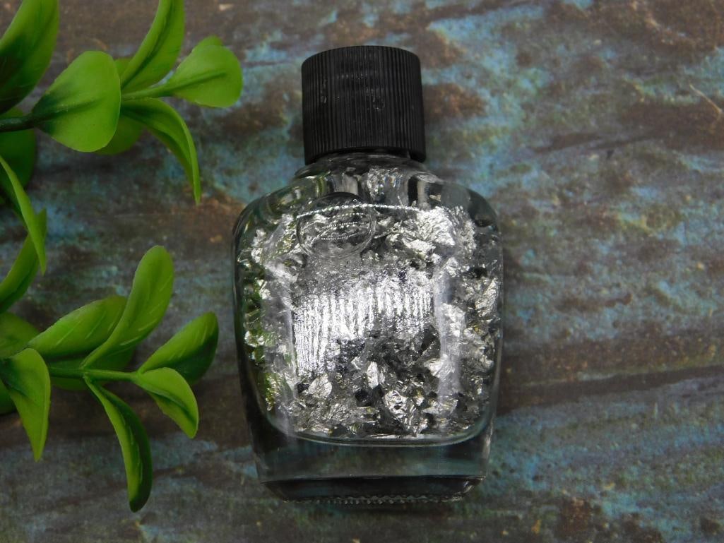 SILVER FLAKES IN BOTTLE ROCK STONE LAPIDARY SPECIMEN: SILVER FLAKES IN BOTTLE ROCK STONE LAPIDARY SPECIMEN