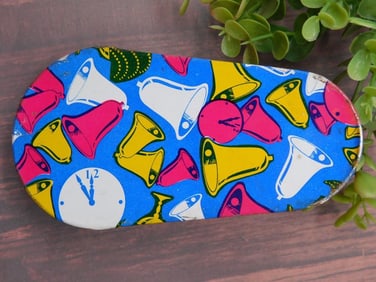 Vintage Metal Noisemaker With Colorful Horn Print Design