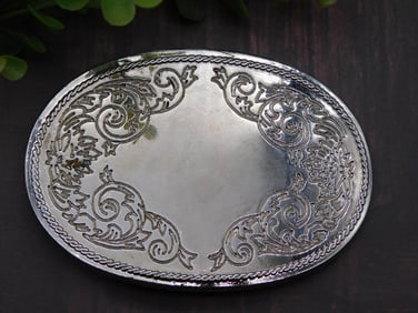 Silver-Tone Oval Belt Buckle with Ornate Scrollwork Design