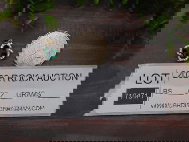 Gold-Tone Pendant With Green Stone and Clear Accents