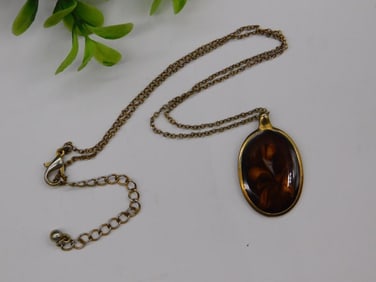 Gold-Tone Necklace with Oval Brown Swirl Pendant