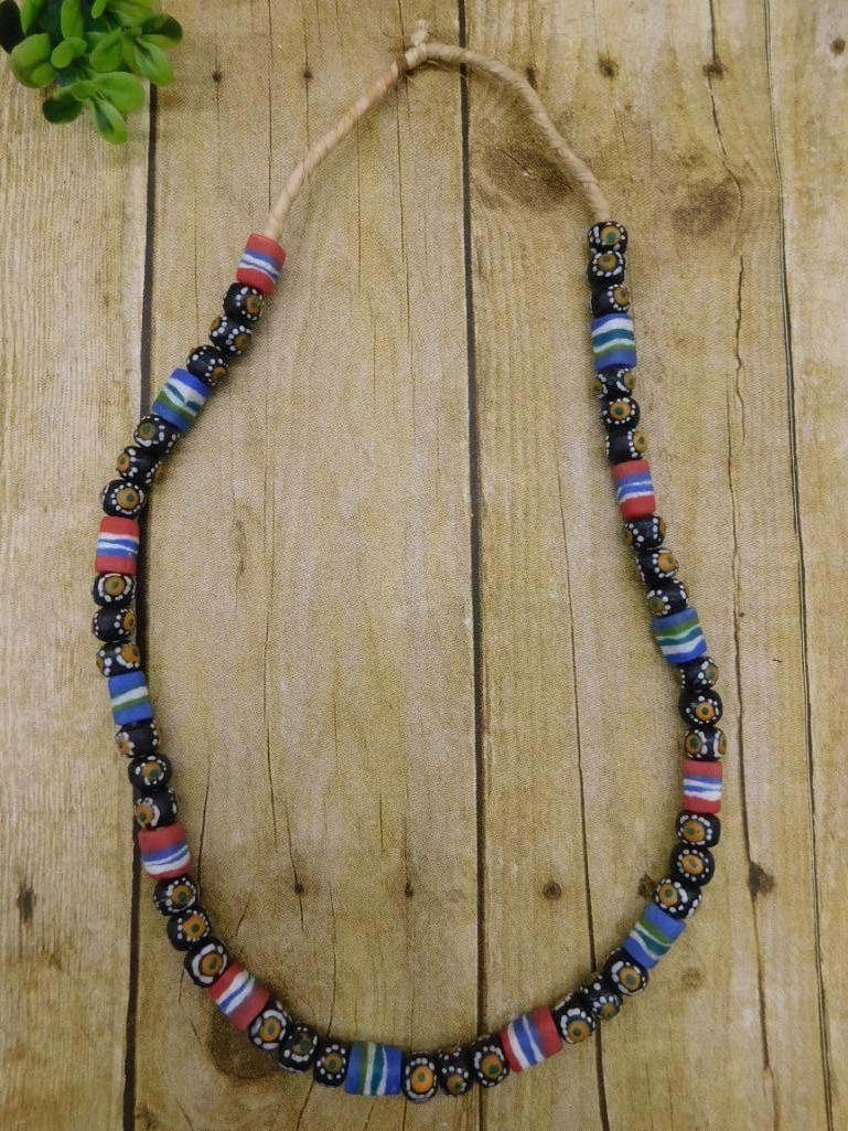 HAND PAINTED FLORAL AND MULTICOLORED AFRICAN TRADE BEADS ROCK STONE LAPIDARY SPECIMEN: HAND PAINTED FLORAL AND MULTICOLORED AFRICAN TRADE BEADS ROCK STONE LAPIDARY SPECIMEN