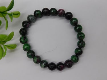 Round Bead Stretch Bracelet with Green and Black Pattern