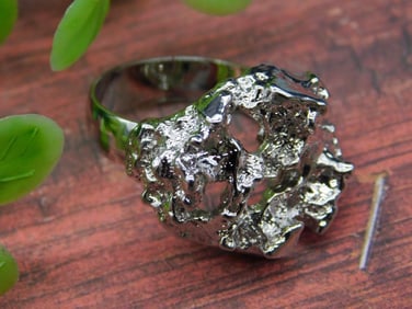 Silver Metal Nugget Style Ring with Abstract Design