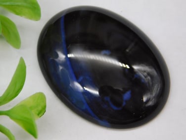Oval Black and Blue Cabochon