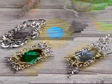 Set of Three Gold-Tone Brooches With Colored Stones