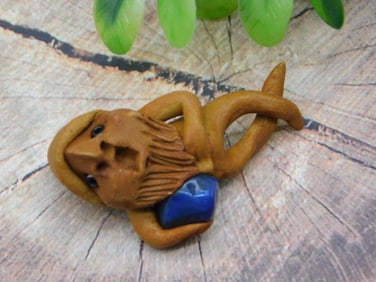 CLAY FIGURINE WITH STONE ROCK STONE LAPIDARY SPECIMEN