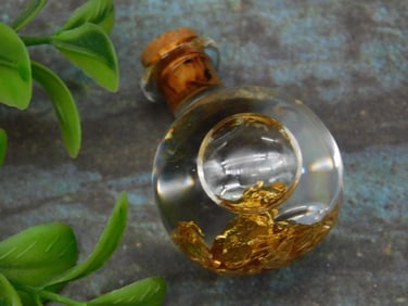 GOLD FLAKES IN BOTTLE ROCK STONE LAPIDARY SPECIMEN